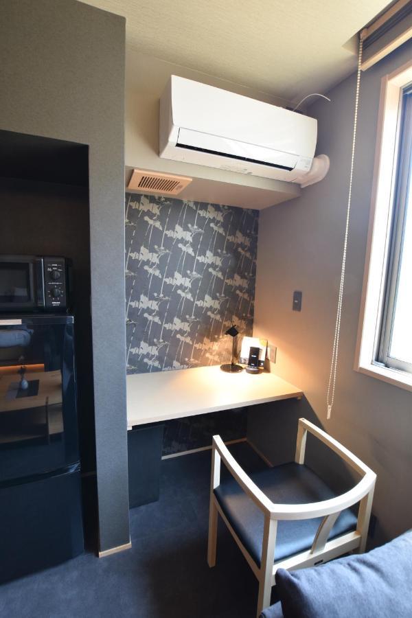 Aparthotel Grand Base Beppu Ekimae Esterno foto